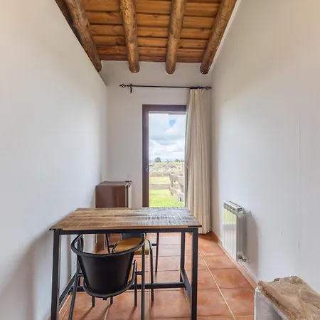 Casitas Granja El Enebral *