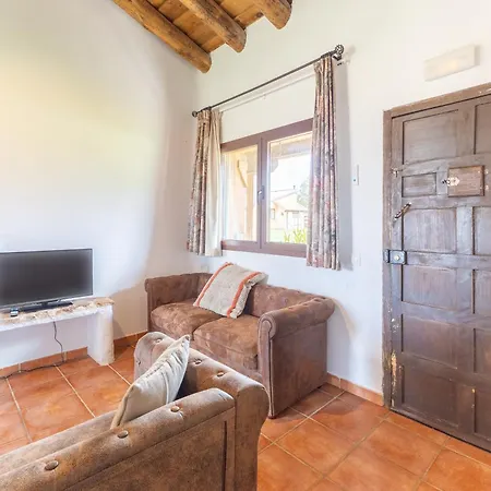 Casitas Granja El Enebral