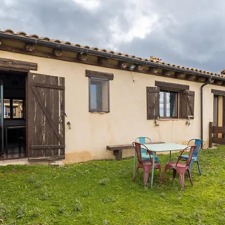 Casitas Granja El Enebral